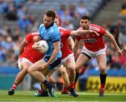 13 July 2019; Jack McCaffrey of Dublin prepares to shoot past Seán White of Cork to score the game's opening goal in the eleventh minute during the GAA Football All-Ireland Senior Championship Quarter-Final Group 2 Phase 1 match between Dublin and Cork at Croke Park in Dublin. Photo by Ray McManus/Sportsfile
