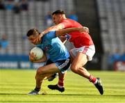 13 July 2019; Cormac Costello of Dublin in action against Thomas Clancy of Cork during the GAA Football All-Ireland Senior Championship Quarter-Final Group 2 Phase 1 match between Dublin and Cork at Croke Park in Dublin. Photo by Ray McManus/Sportsfile