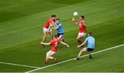 13 July 2019; Cormac Costello of Dublin in action against Cork players, left to right, Tomás Clancy, Liam O’Donovan, and Thomas Clancy, during the GAA Football All-Ireland Senior Championship Quarter-Final Group 2 Phase 1 match between Dublin and Cork at Croke Park in Dublin. Photo by Daire Brennan/Sportsfile
