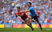 13 July 2019; Thomas Clancy of Cork is tackled by Michael Fitzsimons of Dublin during the GAA Football All-Ireland Senior Championship Quarter-Final Group 2 Phase 1 match between Dublin and Cork at Croke Park in Dublin. Photo by Eóin Noonan/Sportsfile