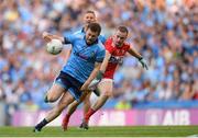 13 July 2019; Jack McCaffrey of Dublin is tackled by Mattie Taylor of Cork during the GAA Football All-Ireland Senior Championship Quarter-Final Group 2 Phase 1 match between Dublin and Cork at Croke Park in Dublin. Photo by Eóin Noonan/Sportsfile