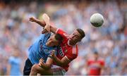 13 July 2019; Con O’Callaghan of Dublin is tackled by Kevin Flahive of Cork during the GAA Football All-Ireland Senior Championship Quarter-Final Group 2 Phase 1 match between Dublin and Cork at Croke Park in Dublin. Photo by Eóin Noonan/Sportsfile