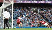 13 July 2019; Niall Scully of Dublin scores his side's third goal of the game despite the efforts of Kevin O’Donovan of Cork during the GAA Football All-Ireland Senior Championship Quarter-Final Group 2 Phase 1 match between Dublin and Cork at Croke Park in Dublin. Photo by Eóin Noonan/Sportsfile