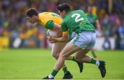 14 July 2019; Jamie Brennan of Donegal in action against Séamus Lavin of Meath during the GAA Football All-Ireland Senior Championship Quarter-Final Group 1 Phase 1 match between Donegal and Meath at MacCumhaill Park in Ballybofey, Donegal. Photo by Daire Brennan/Sportsfile