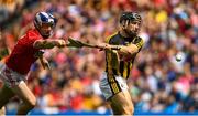 14 July 2019; Richie Hogan of Kilkenny shoots to score his side's second goal of the game despite the attention of Sean O'Donoghue of Cork during the GAA Hurling All-Ireland Senior Championship quarter-final match between Kilkenny and Cork at Croke Park in Dublin. Photo by Ramsey Cardy/Sportsfile