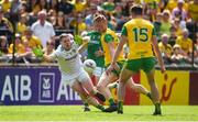 14 July 2019; Oisín Gallen of Donegal scores his side's second goal past Andrew Colgan of Meath during the GAA Football All-Ireland Senior Championship Quarter-Final Group 1 Phase 1 match between Donegal and Meath at MacCumhaill Park in Ballybofey, Donegal. Photo by Daire Brennan/Sportsfile