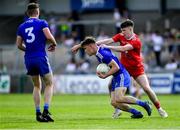 14 July 2019; Shane Hanratty of Monaghan, supported by team-mate Ronan Boyle, left, is tackled by Daniel Fullerton of Tyrone during the Electric Ireland Ulster GAA Football Minor Championship Final match between Monaghan and Tyrone at Athletic Grounds in Armagh. Photo by Piaras Ó Mídheach/Sportsfile