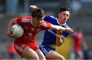 14 July 2019; Mark Devlin of Tyrone gets past Shane Slevin of Monaghan during the Electric Ireland Ulster GAA Football Minor Championship Final match between Monaghan and Tyrone at Athletic Grounds in Armagh. Photo by Piaras Ó Mídheach/Sportsfile