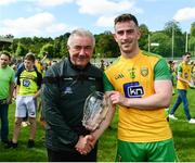 14 July 2019; Donegal county board chairman Mick McGrath makes a presentation to Patrick McBrearty of Donegal to mark his 100th appearance for Donegal after the GAA Football All-Ireland Senior Championship Quarter-Final Group 1 Phase 1 match between Donegal and Meath at MacCumhaill Park in Ballybofey, Donegal. Photo by Daire Brennan/Sportsfile