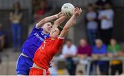 14 July 2019; Liam McDonald of Monaghan in action against Micheál McCann of Tyrone during the Electric Ireland Ulster GAA Football Minor Championship Final match between Monaghan and Tyrone at Athletic Grounds in Armagh. Photo by Piaras Ó Mídheach/Sportsfile