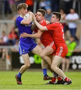 14 July 2019; Karl Gallagher of Monaghan in action against Micheál McCann, centre, and Conor Cuddy of Tyrone during the Electric Ireland Ulster GAA Football Minor Championship Final match between Monaghan and Tyrone at Athletic Grounds in Armagh. Photo by Piaras Ó Mídheach/Sportsfile