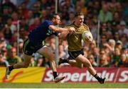 14 July 2019; Tom O'Sullivan of Kerry is tackled by Keith Higgins of Mayo during the GAA Football All-Ireland Senior Championship Quarter-Final Group 1 Phase 1 match between Kerry and Mayo at Fitzgerald Stadium in Killarney, Kerry. Photo by Eóin Noonan/Sportsfile