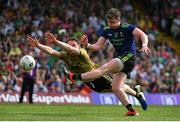 14 July 2019; Cillian O'Connor of Mayo has a shot on goal despite the best efforts of Tadhg Morley of Kerry during the GAA Football All-Ireland Senior Championship Quarter-Final Group 1 Phase 1 match between Kerry and Mayo at Fitzgerald Stadium in Killarney, Kerry. Photo by Brendan Moran/Sportsfile