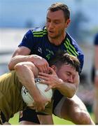 14 July 2019; James O'Donoghue of Kerry is tackled by Keith Higgins of Mayo during the GAA Football All-Ireland Senior Championship Quarter-Final Group 1 Phase 1 match between Kerry and Mayo at Fitzgerald Stadium in Killarney, Kerry. Photo by Brendan Moran/Sportsfile
