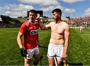 14 July 2019; Kilkenny captain TJ Reid, wearing a Kilkenny jersey, with Seamus Harnedy of Cork after the GAA Hurling All-Ireland Senior Championship quarter-final match between Kilkenny and Cork at Croke Park in Dublin. Photo by Ray McManus/Sportsfile