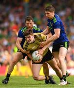 14 July 2019; Sean O'Shea of Kerry is tackled by Chris Barrett, left, and Lee Keegan during the GAA Football All-Ireland Senior Championship Quarter-Final Group 1 Phase 1 match between Kerry and Mayo at Fitzgerald Stadium in Killarney, Kerry. Photo by Eóin Noonan/Sportsfile