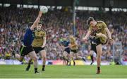 14 July 2019; David Clifford of Kerry kicks a point despite the efforts of Brendan Harrison of Mayo during the GAA Football All-Ireland Senior Championship Quarter-Final Group 1 Phase 1 match between Kerry and Mayo at Fitzgerald Stadium in Killarney, Kerry. Photo by Brendan Moran/Sportsfile