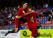 14 July 2019; Gonçalo Bento Soares Cardoso celebrates after scoring his side's first goal with his Portugal team-mate Vitor Ferreira, left, during the 2019 UEFA European U19 Championships group A match between Italy and Portugal at Banants Stadium in Yerevan, Armenia. Photo by Stephen McCarthy/Sportsfile