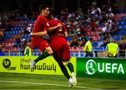 14 July 2019; Gonçalo Bento Soares Cardoso celebrates after scoring his side's first goal with his Portugal team-mate Vitor Ferreira, left, during the 2019 UEFA European U19 Championships group A match between Italy and Portugal at Banants Stadium in Yerevan, Armenia. Photo by Stephen McCarthy/Sportsfile