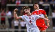 14 July 2019; Seán Óg McAleer of Tyrone celebrates scoring his side's second goal as Oran McGill of Derry looks on dejected during the EirGrid Ulster GAA Football U20 Championship Final match between Derry and Tyrone at Athletic Grounds in Armagh. Photo by Piaras Ó Mídheach/Sportsfile