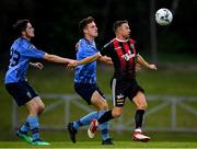 15 July 2019; Keith Ward of Bohemians in action against Evan Farrell, left, and Harry McEvoy of UCD during the SSE Airtricity League Premier Division match between UCD and Bohemians at UCD Bowl in Dublin. Photo by Seb Daly/Sportsfile