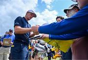16 July 2019; Justin Rose of England signs autographs during a practice round ahead of the 148th Open Championship at Royal Portrush in Portrush, Co. Antrim. Photo by Brendan Moran/Sportsfile