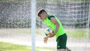 16 July 2019; Matt Everitt is hit by the pitch watering system during a Republic of Ireland training session at Vagharshapat Football Academy during the 2019 UEFA European U19 Championships in Yerevan, Armenia. Photo by Stephen McCarthy/Sportsfile