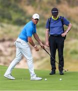 16 July 2019; Rory McIlroy of Northern and his coach Michael Bannon on the 15th green during a practice round ahead of the 148th Open Championship at Royal Portrush in Portrush, Co. Antrim. Photo by John Dickson/Sportsfile