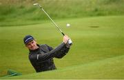 17 July 2019; Justin Rose of England plays a shot from a bunker on the 13th hole during a practice round ahead of the 148th Open Championship at Royal Portrush in Portrush, Co. Antrim. Photo by Ramsey Cardy/Sportsfile