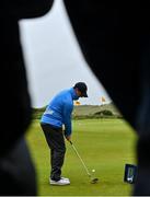 17 July 2019; Rory McIlroy of Northern Ireland is seen through a gallery on the practice range during a practice round ahead of the 148th Open Championship at Royal Portrush in Portrush, Co. Antrim. Photo by Brendan Moran/Sportsfile