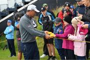 17 July 2019; Padraig Harrington of Ireland signs autographs during a practice round ahead of the 148th Open Championship at Royal Portrush in Portrush, Co. Antrim. Photo by Ramsey Cardy/Sportsfile