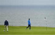 17 July 2019; Rory McIlroy of Northern Ireland, left, and Justin Thomas of USA during a practice round ahead of the 148th Open Championship at Royal Portrush in Portrush, Co. Antrim. Photo by Brendan Moran/Sportsfile