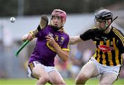 17 July 2019; Diarmuid Doyle of Wexford in action against Conor Flynn of Kilkenny during the Bord Gais Energy Leinster GAA Hurling U20 Championship Final match between Kilkenny and Wexford at Innovate Wexford Park in Wexford. Photo by Matt Browne/Sportsfile