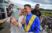 17 July 2019; Racegoer Dymphna Fagan takes a selfie with Jockey Frankie Dettori during day 3 of the Killarney Racing Festival at Killarney Racecourse in Kerry. Photo by David Fitzgerald/Sportsfile