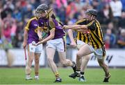 17 July 2019; Cian Fitzhenry of Wexford in action against Mikey Butler of Kilkenny during the Bord Gais Energy Leinster GAA Hurling U20 Championship Final match between Kilkenny and Wexford at Innovate Wexford Park in Wexford. Photo by Matt Browne/Sportsfile