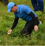18 July 2019; Rory McIlroy of Northern Ireland finds his ball on the 1st hole during Day One of the 148th Open Championship at Royal Portrush in Portrush, Co Antrim. Photo by Ramsey Cardy/Sportsfile