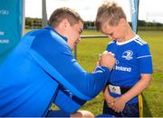 18 July 2019; Leinster player Scott Penny with participants during the Bank of Ireland Leinster Rugby Summer Camp at Seapoint Rugby Club in Glenageary, Dublin. Photo by Harry Murphy/Sportsfile