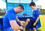 18 July 2019; Leinster player Peter Dooley signs autographs for participants during the Bank of Ireland Leinster Rugby Summer Camp at Portlaoise RFC in Portlaoise, Co Laois. Photo by Sam Barnes/Sportsfile