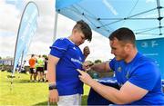 18 July 2019; Leinster player Peter Dooley signs autographs for participants during the Bank of Ireland Leinster Rugby Summer Camp at Portlaoise RFC in Portlaoise, Co Laois. Photo by Sam Barnes/Sportsfile