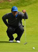 18 July 2019; Tiger Woods of USA lines up a putt on the 4th green during Day One of the 148th Open Championship at Royal Portrush in Portrush, Co Antrim. Photo by Brendan Moran/Sportsfile