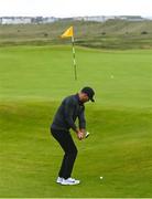 18 July 2019; Brooks Koepka of USA chips onto the 16th green during Day One of the 148th Open Championship at Royal Portrush in Portrush, Co Antrim. Photo by Ramsey Cardy/Sportsfile