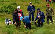 18 July 2019; Rory McIlroy of Northern Ireland searches for his ball on the 1st hole during Day One of the 148th Open Championship at Royal Portrush in Portrush, Co Antrim. Photo by Ramsey Cardy/Sportsfile Photo by Ramsey Cardy/Sportsfile