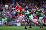 18 July 2019; Sean Meehan of Cork in action against Fiachra Clifford of Kerry during the EirGrid Munster GAA Football U20 Championship Final match between Cork and Kerry at Páirc Ui Rinn in Cork. Photo by Matt Browne/Sportsfile