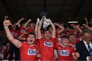 18 July 2019; Cork captain Peter O'Driscoll lifts the cup alongside his team-mates following the EirGrid Munster GAA Football U20 Championship Final match between Cork and Kerry at Páirc Ui Rinn in Cork. Photo by Matt Browne/Sportsfile