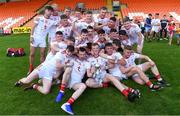 14 July 2019; Tyrone captain Ruairí Gormley, centre, and his team-mate celebrate with the Corn Dónall Ó Murchú after the EirGrid Ulster GAA Football U20 Championship Final match between Derry and Tyrone at Athletic Grounds in Armagh. Photo by Piaras Ó Mídheach/Sportsfile