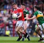 18 July 2019; Peter O'Driscoll of Cork in action against Sean Horan and Killian Falvey of Kerry during the EirGrid Munster GAA Football U20 Championship Final match between Cork and Kerry at Páirc Ui Rinn in Cork. Photo by Matt Browne/Sportsfile