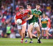 18 July 2019; Cathail O'Mahony of Cork in action against Adam Donoghue of Kerry during the EirGrid Munster GAA Football U20 Championship Final match between Cork and Kerry at Páirc Ui Rinn in Cork. Photo by Matt Browne/Sportsfile