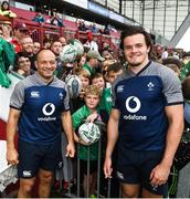 19 July 2019; Rory Best, left, and Jacob Stockdale pose for a photo with fans following an Ireland Rugby open training session at Thomond Park in Limerick. Photo by David Fitzgerald/Sportsfile