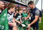 19 July 2019; Jonathan Sexton signs autographs for fans following an Ireland Rugby open training session at Thomond Park in Limerick. Photo by David Fitzgerald/Sportsfile