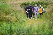 19 July 2019; Shane Lowry of Ireland and Branden Grace of South Africa make their way up the 16th fairway during Day Two of the 148th Open Championship at Royal Portrush in Portrush, Co Antrim. Photo by Ramsey Cardy/Sportsfile